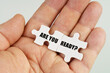 © Dzmitry - In the hand of a man are puzzles with the inscription - Are You Ready