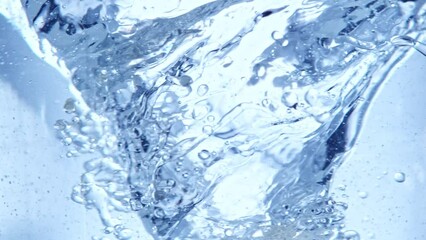 Wall Mural - super slow motion shot of oil and water blue whirl at 1000fps.