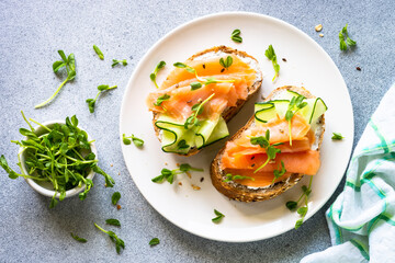 Sticker - Open sandwich with cream cheese, salmon and cucumber.