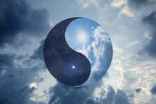 Ying Yang Symbol Against Cloudy Sky. Feng Shui Philosophy