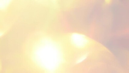 Wall Mural - Rose Gold Bokeh with Light Leaks Movement. Abstract moving background. Large moving bokeh with bright sunbeams and light reflections randomly move. Multi-layer Lens flare effect.