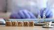 © megaflopp - Word lupus collected of wooden cubes in raw