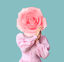 Woman With Pink Rose Flower Instead Of Her Head On Light Blue Background