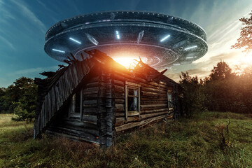 Wall Mural - ufo, an alien saucer hovering over the field, hovering motionless in the air. unidentified flying ob