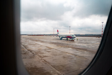 Wall Mural - view through window of aircraft during flight
