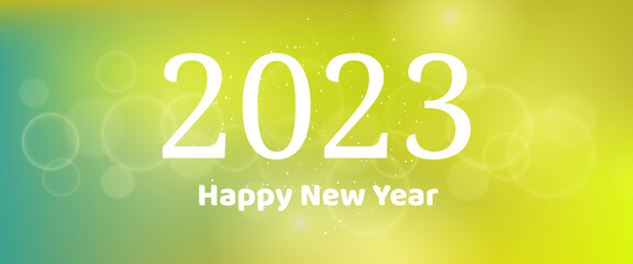 Happy new year 2023 incription on blurred background