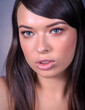 Very Tight Close-up of Beautiful Caucasian Woman With Cat Blue Eyes, Full Shinny Lips and Open Mouth Looking Away