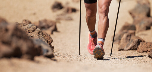 Wall Mural - Trail running man on mountain path exercising	