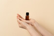 © Grzegorz - woman holding in hand a jar of liquid