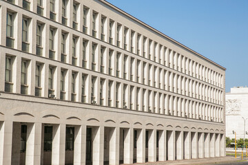 Office building with many arches. It is located in the EUR quarter of Rome, Italy.