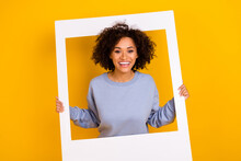 Photo Of Cheerful Charming Lady Toothy Smile Hold Album Set Card Window Isolated On Yellow Color Background