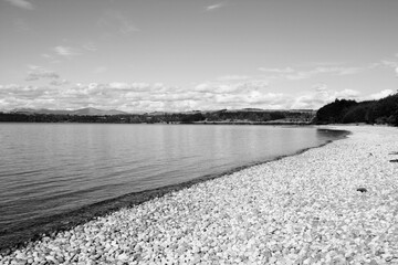 Sticker - Te Anau lake in New Zealand. Black and white retro photo style.