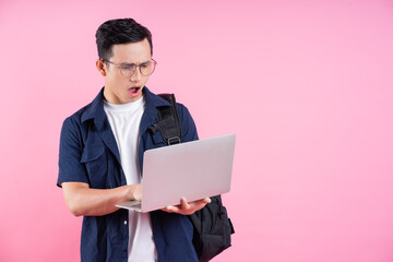 Canvas Print - Image of young Asian college student on pink background