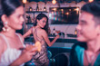 An attractive single woman spots her ex hanging out with his new girlfriend. An awkward scenario noticing her former lover at the bar. Feeling jealous and sad seeing him move on.