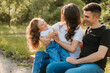 © stenkovlad - Young family with daughter spending time outdoors