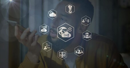 Sticker - Animation of connections with technology icons over biracial man using smartphone