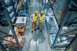© ivanko80 - Two employees with tablet at logistics center warehouse