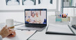 © tirachard - Young Asia lady doctor in white medical uniform with stethoscope using computer laptop talking video conference call with patient at desk in health clinic or hospital. Consulting and therapy concept.