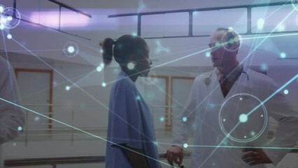 Canvas Print - Animation of data processing over diverse doctors talking