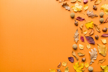 Wall Mural - Autumn composition. Pattern made of dried leaves and other design accessories on table. Flat lay, top view