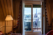Cosy Paris hotel room with balcony and beautiful view at Eiffel tower and city