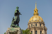 Statue Of The Marechal E.Fayolle In Front Of The Golden Cupola Of The Hotel Des Invalides In Paris, France
