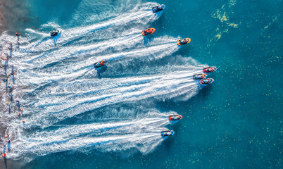 Wall Mural - aquabike championship on jarun lake, zagreb croatia. aerial view of the speed watercrafts in clear b