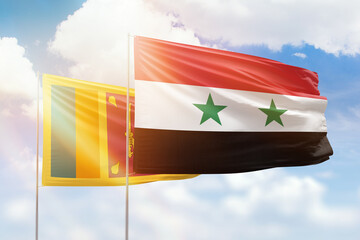 Sunny blue sky and flags of syria and sri lanka