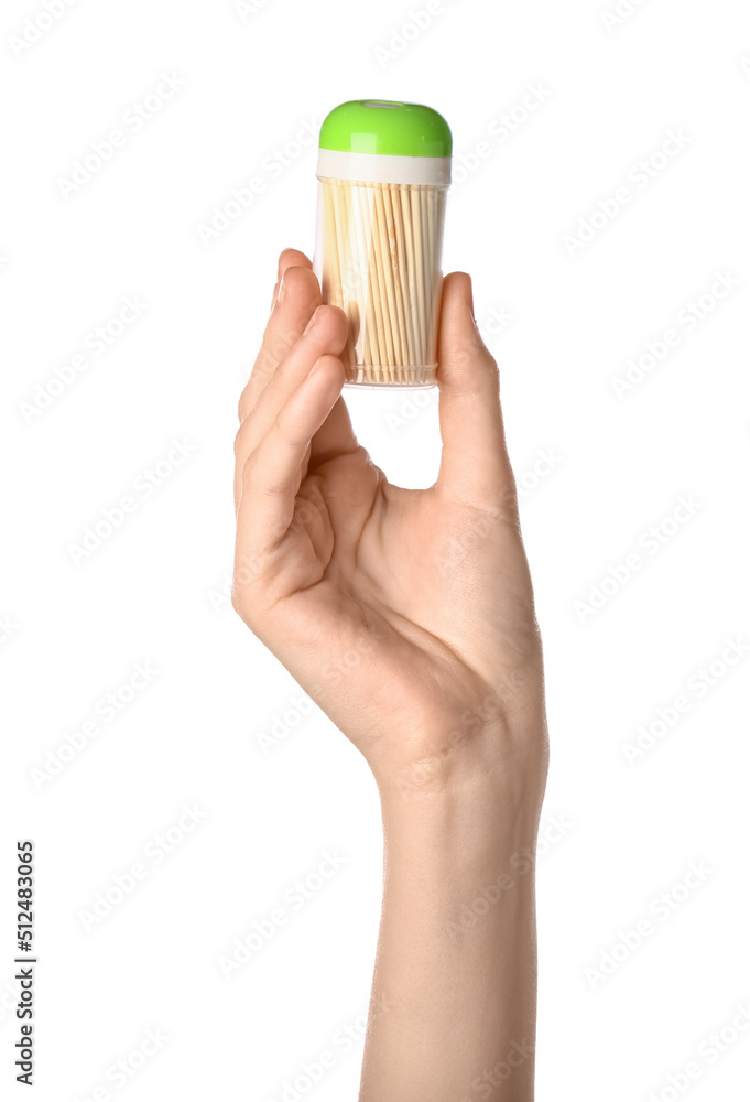 Woman holding box with bamboo toothpicks on white background