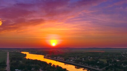 Wall Mural - Amazing red sky at morning, spectacular moving aerial drone view.
