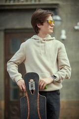 Wall Mural - teen with longboard