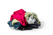 © Ivan - Textile ready to recycle, isolated on white background. Heap of used colorful clothes for recycling