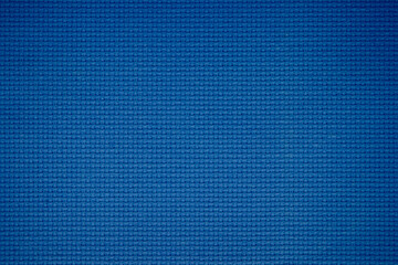 Wall Mural - Closeup of blue fabric texture for background used. Pattern blue dark denim, linen, natural cotton satin textile textured cloth burlap seamless blank.