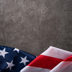 Wall Mural - Concept of Independence day or Memorial day. Flag over dark gray table background.