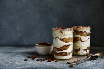 Wall Mural - Delidious italian dessert - tiramisu with strawberry and chocolate.