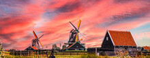 Dutch Old Historic Windmills - Sunset Light. Zaanse Schans, Zaandam - The Netherlands