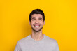 © deagreez - Photo of impressed brunet young guy look up wear trend cloth isolated on yellow color background