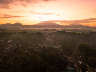 Wall Mural - Drone photo of Sunrise sky with mountains on the countryside