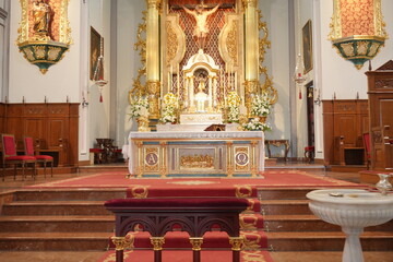 church with gold and red interiors