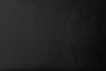 Old black grunge background. Dark textured wallpaper