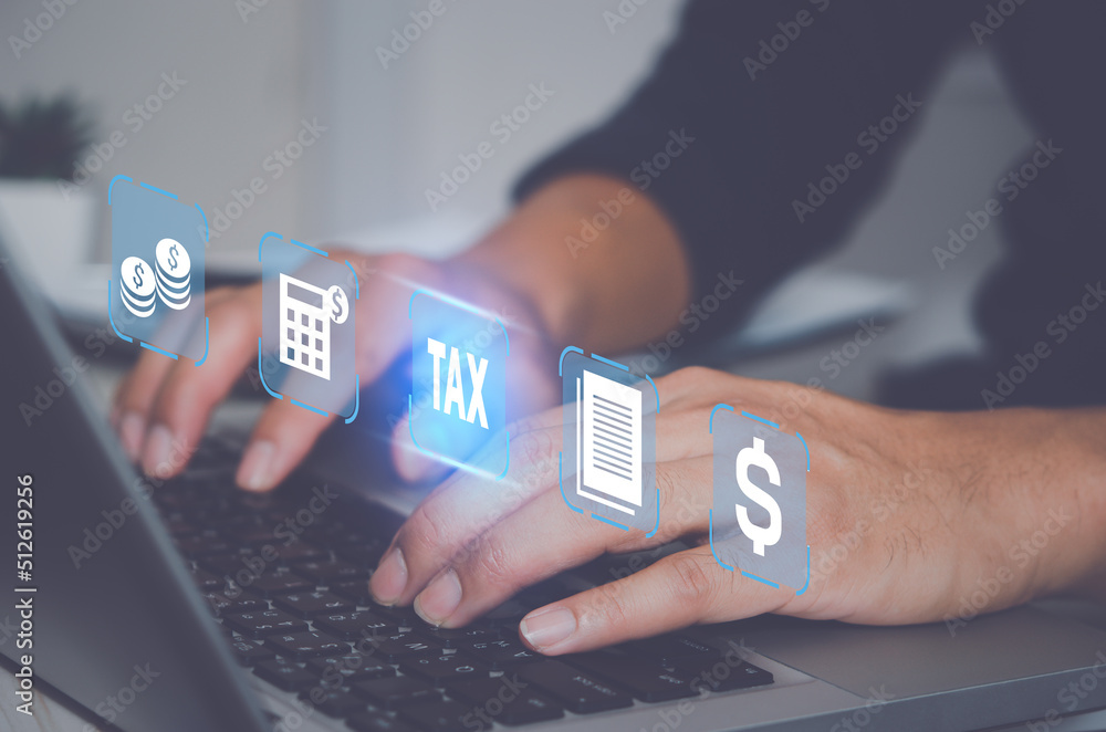 Tax Computer Complete online tax return form with laptop computer. Finance and tax ...