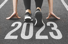 Close-up Of Feet In Sneakers At The Start. Beginning And Start Of The New Year 2023, Goals And Plans For The Next Year