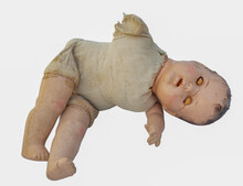Scary Spooky Vintage Doll Baby.  Isolated. Horizontal.