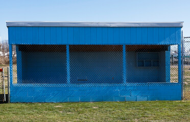 Wall Mural - Rural community wooden baseball dugout. Simple sparse.