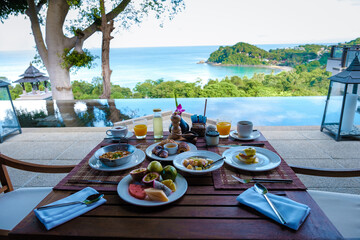 Wall Mural - Luxury breakfast with a view at the pool and ocean in Thailand Koh Lanta