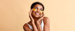 © Pixel-Shot - Banner with beautiful African-American woman using under-eye patches on beige background