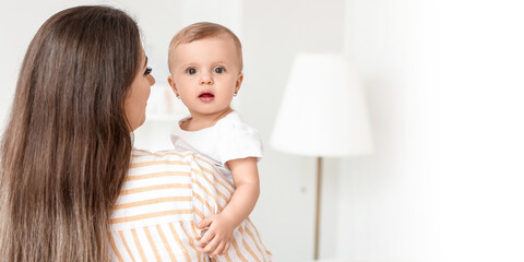 Sticker - Happy mother with cute little baby at home