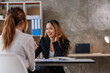 © David - Cropped shot of Asian Business woman diverse coworkers working together in the boardroom, brainstorming, discussing, and analyzing business report strategy collaboration.