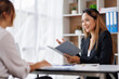 © David - Cropped shot of Asian Business woman diverse coworkers working together in the boardroom, brainstorming, discussing, and analyzing business report strategy collaboration.