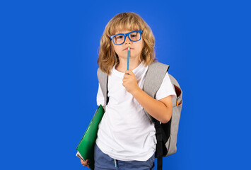 Back to school. School child with book on isolated background. Thinking pensive kids, thoughtful emotions of school child, clever smart funny nerd have idea.